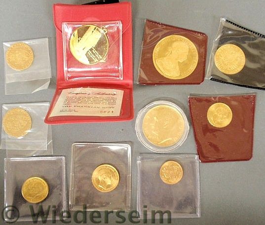 Lot of foreign gold and one Franklin