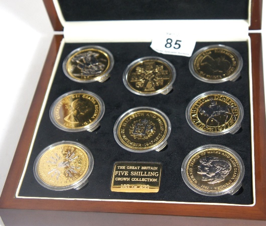 A cased proof set of 5 shilling 15771a
