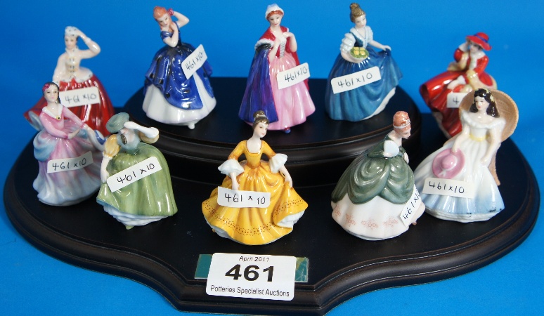 Royal Doulton Miniature Figures on wooden