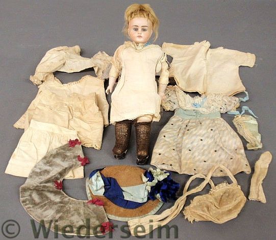Bisque head doll 19th c. with a stitched