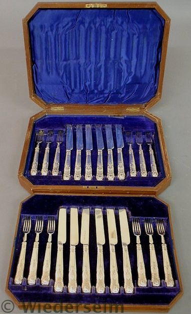 Set of twelve English silver fish forks