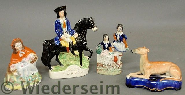 Four Staffordshire figures including