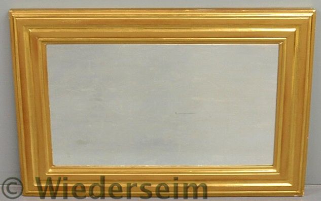 Large rectangular gilt framed mirror.
