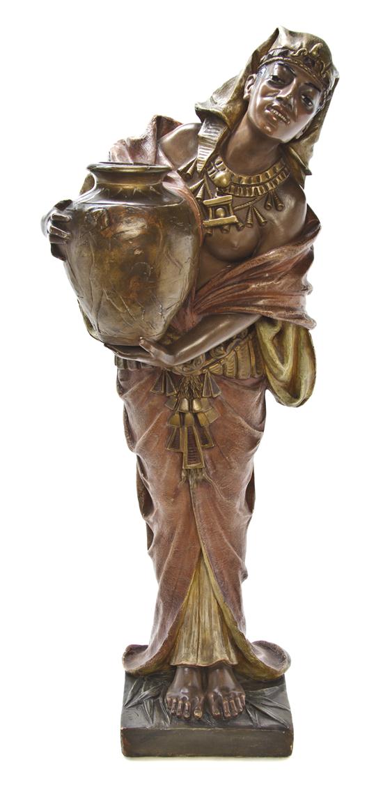 An Egyptian Revival Terracotta Figure
