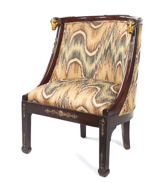 An Empire Mahogany Parcel Gilt