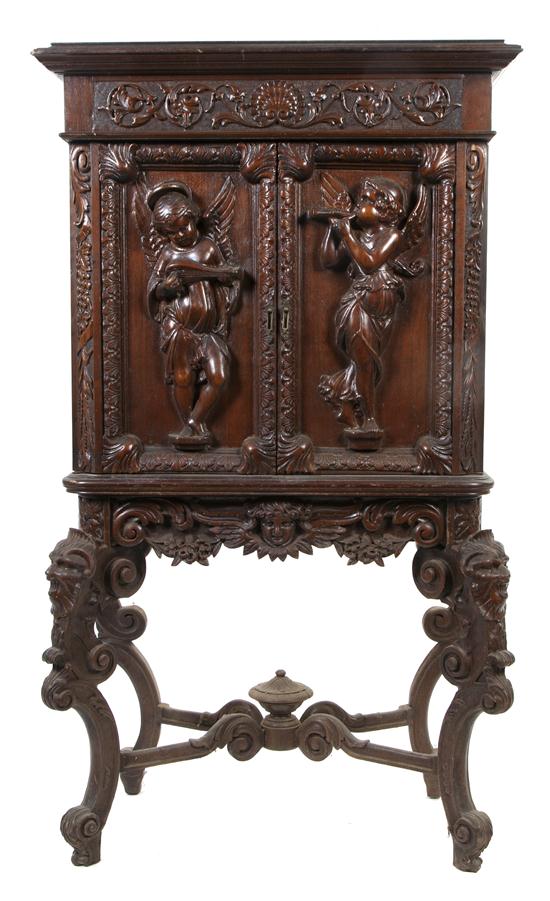 A Continental Carved Cabinet on 155d47