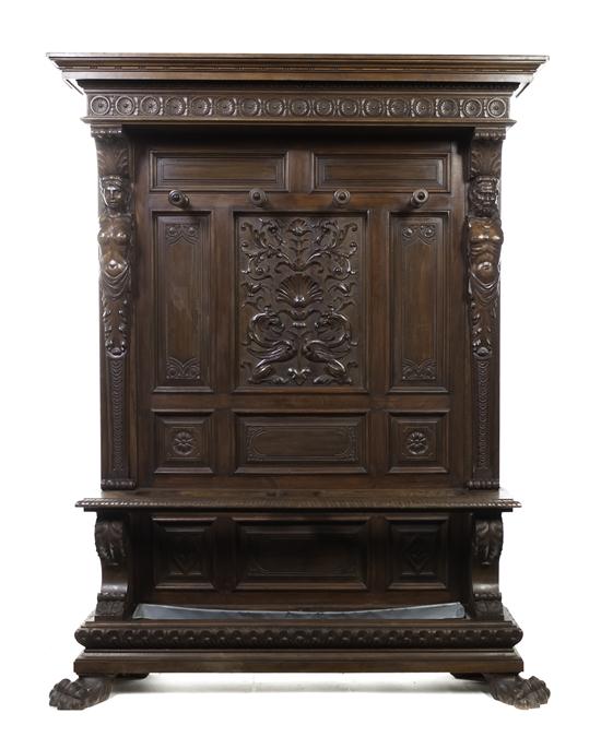 A Renaissance Revival Carved Walnut