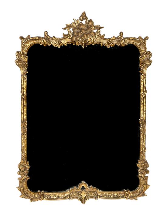 *An Italian Giltwood Mirror having