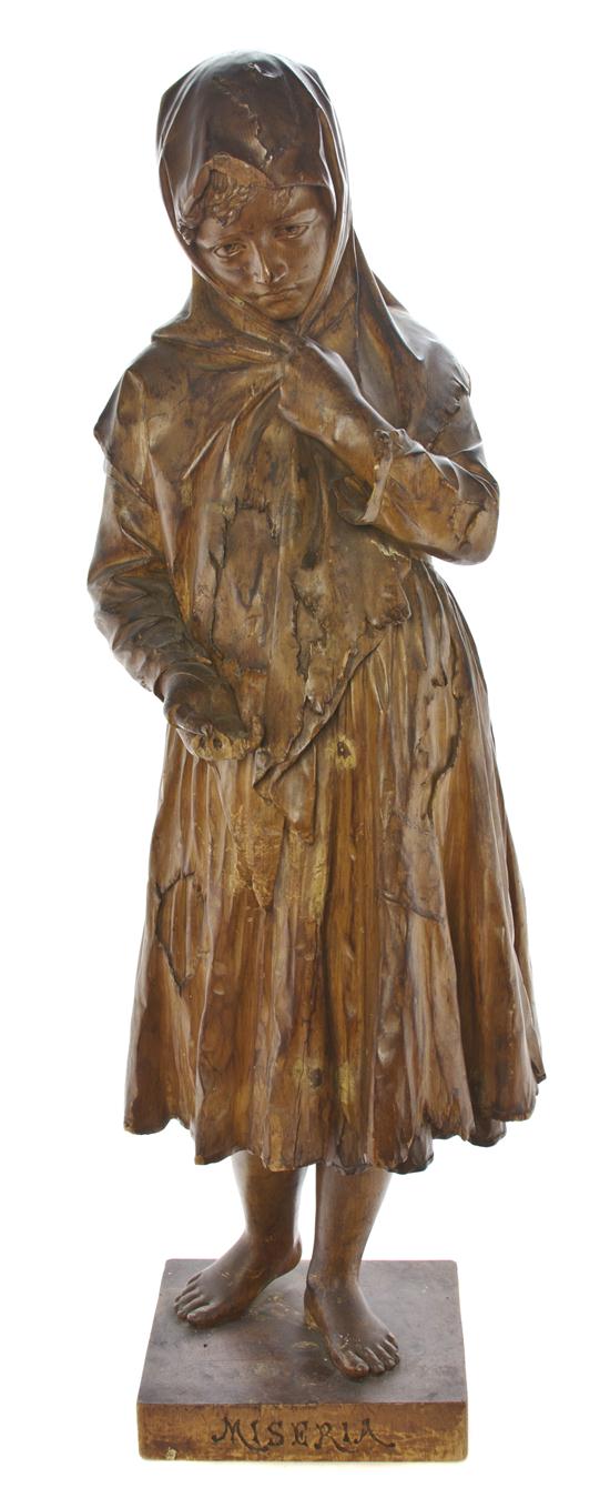 An Italian Carved Wood Figure M.