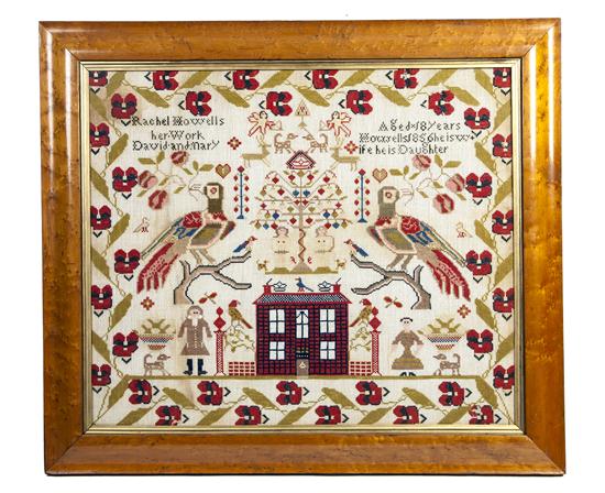 A Needlepoint Sampler having central