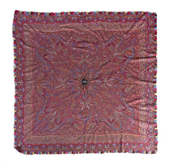 A Woven Paisley Shawl having a central