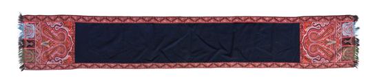 A Paisley Table Runner having a