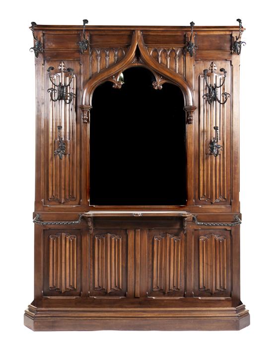 A Gothic Revival Oak Iron and Cast Metal