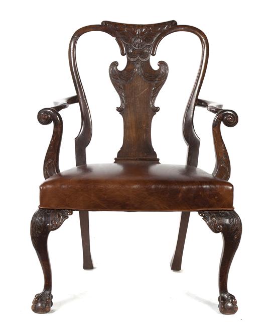 A Queen Anne Walnut Open Armchair