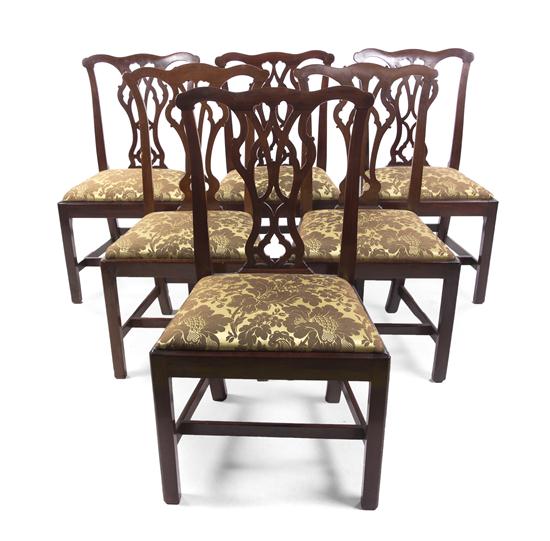 A Set of Eight Chippendale Style Dining