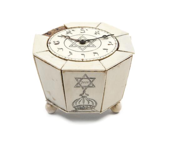 *An Ivory Veneered Table Clock of hexagonal