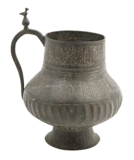 A Middle Eastern Metal Vessel of