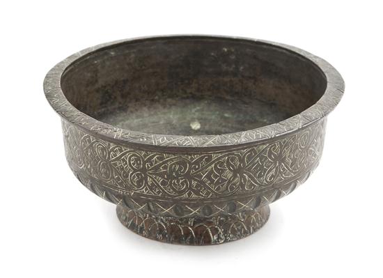 A Middle Eastern Footed Bronze Bowl