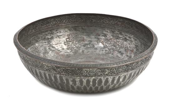 A Middle Eastern Silvered Metal Bowl