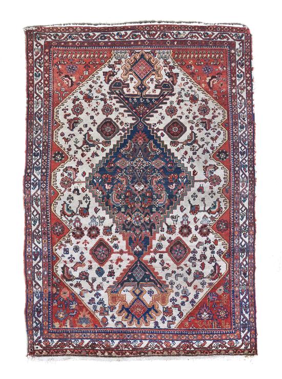 A Heriz Wool Rug having a stylized 155fbf