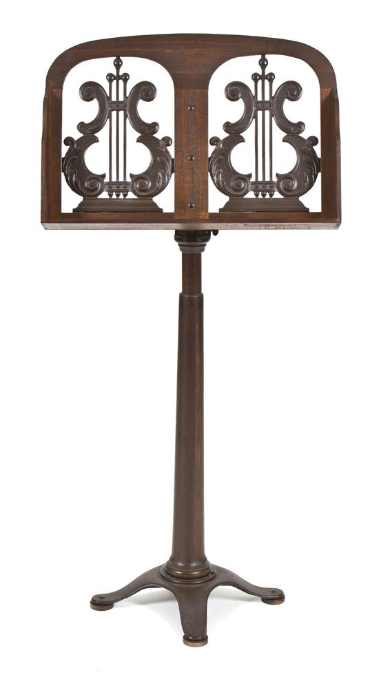 A Walnut and Cast Metal Music Stand