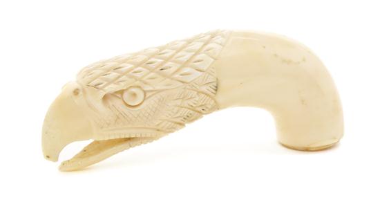 A Carved Walrus Ivory Cane Handle in