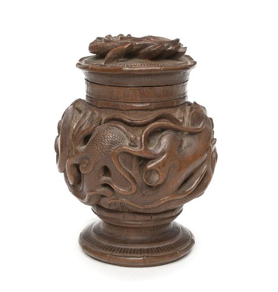 A Carved Walnut Tobacco Box of