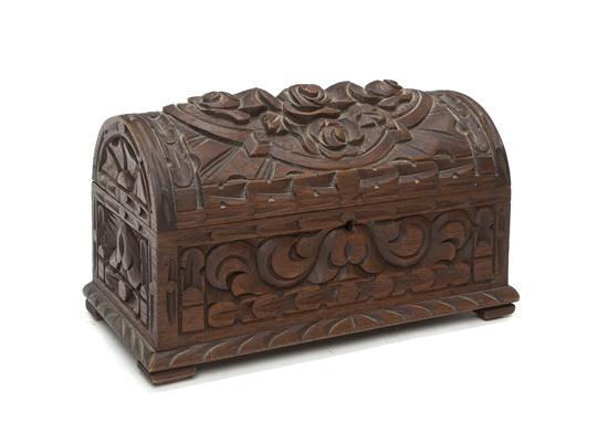 A Carved Walnut Table Casket of