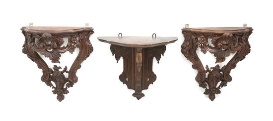 A Pair of Continental Carved Walnut 1561dd