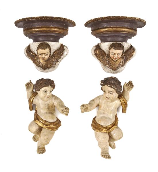 A Pair of Wood and Plaster Putti together