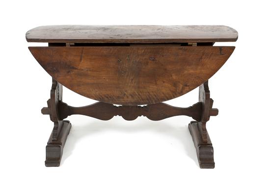 A Continental Walnut Drop-Leaf Pub Table