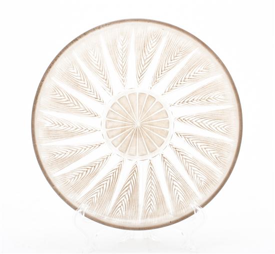 A Lalique Glass Plate the central rosette