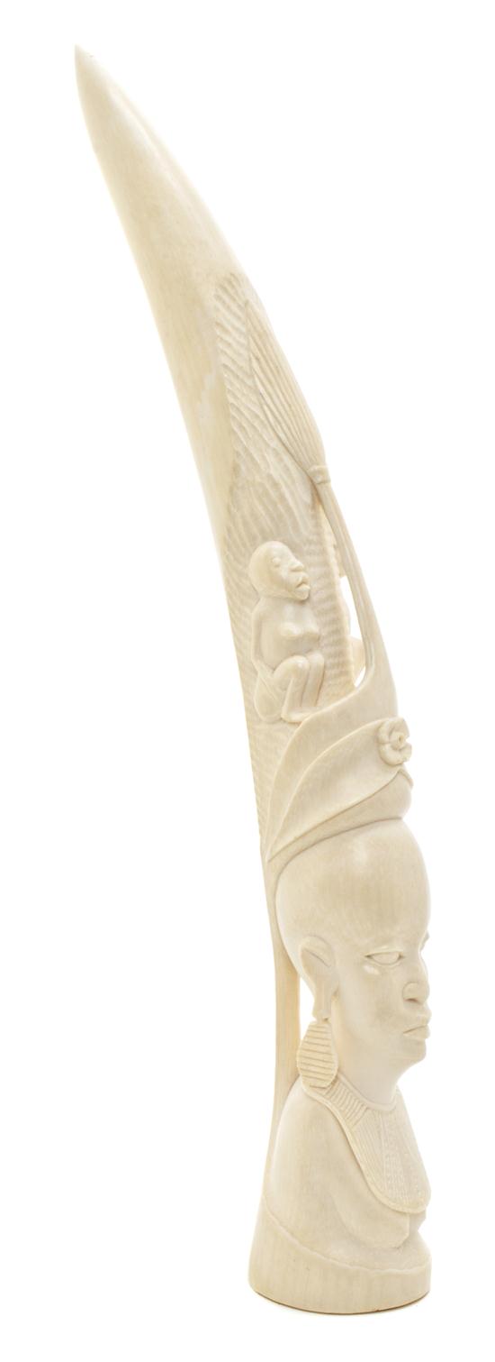 A Carved Ivory Tusk of an African Woman