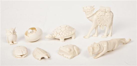 A Collection of Eight Carved Ivory Animals