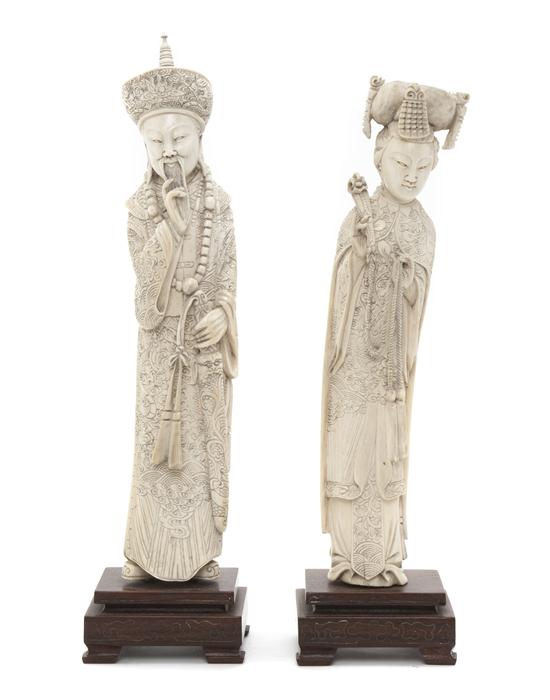 A Pair of Chinese Carved Ivory Figures