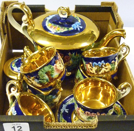 A Capodimonte embossed tea set