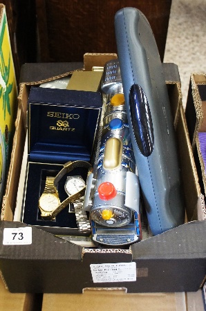 A box containing various Trade Magazines