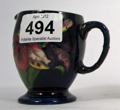 Moorcroft Jug decorated with Orchids