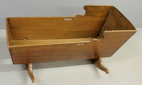 Pine cradle c.1800 stained walnut. 24h.x43l.x24w.