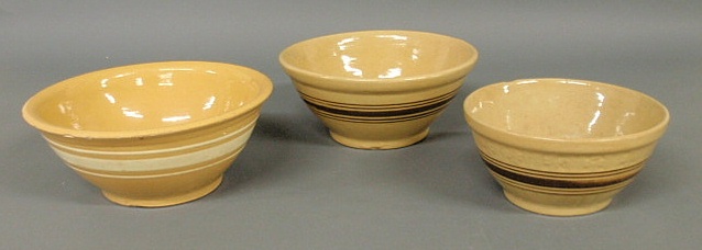 Three yellowware mixing bowls-