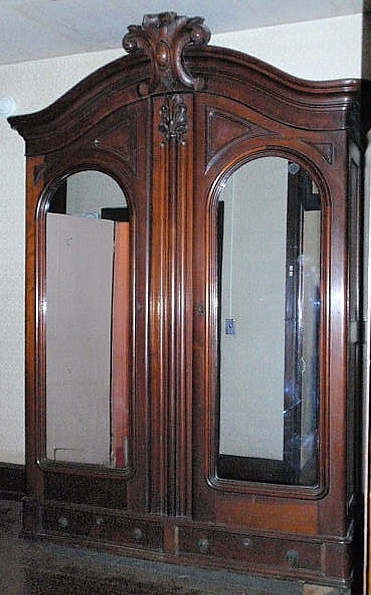 Massive Victorian walnut armoire with