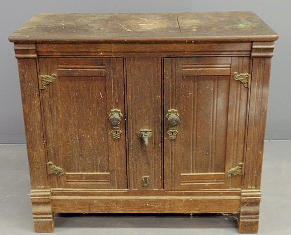 Early oak cased icebox with a galvanized 1568ad