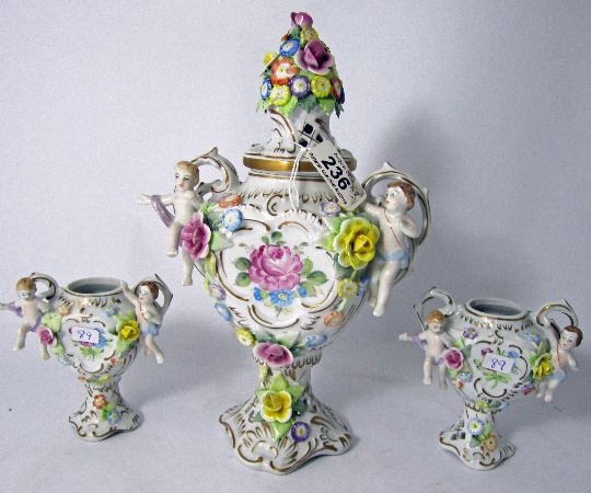 A Trio of Porcelain Floral Vases with