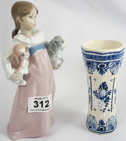 A Lladro Figure of Little Girl arms