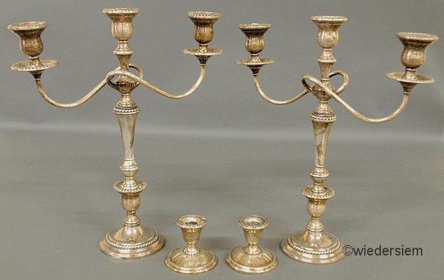 Pair of weighted sterling silver candelabra