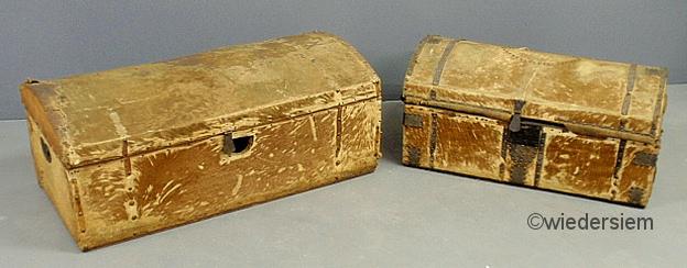 Two similar hide skin covered dome 1595f4