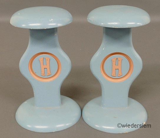 Pair of blue painted Hermes hat stands.