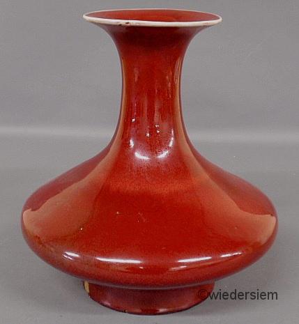 Asian red porcelain vase probably