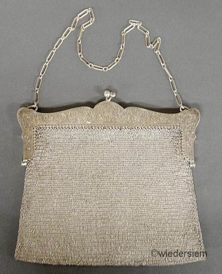Sterling silver mesh purse with an ornately
