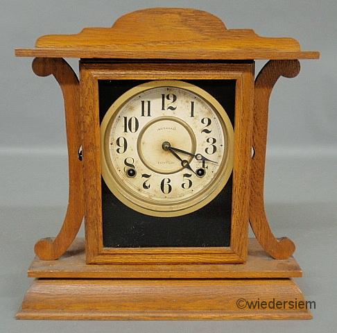 Oak cased eight-day mantel clock by